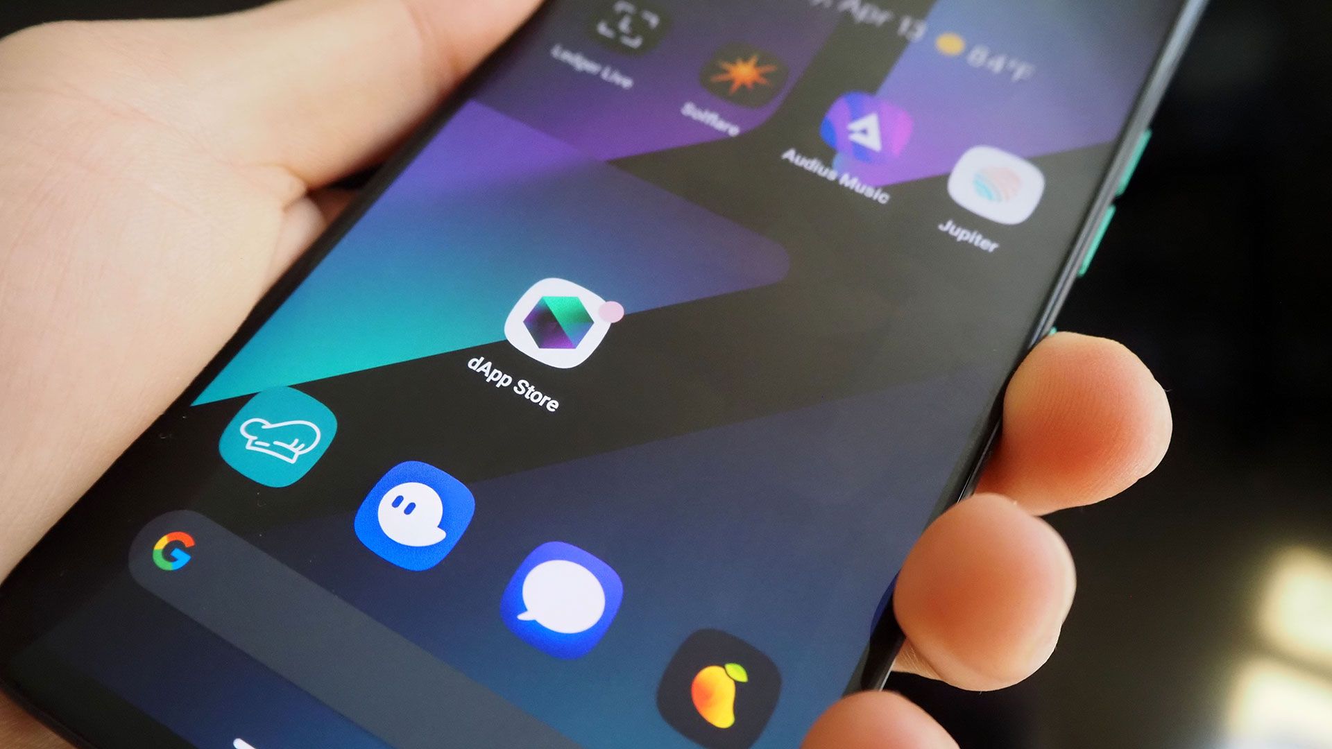 Close-up of cracked Solana Saga phone screen showing durability issues for crypto mobile users 2025
