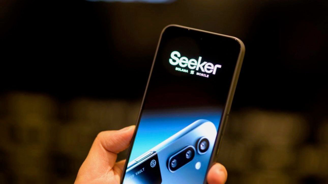 Solana Saga smartphone screen displaying Seed Vault settings for secure cryptocurrency wallet seed phrase backup guide